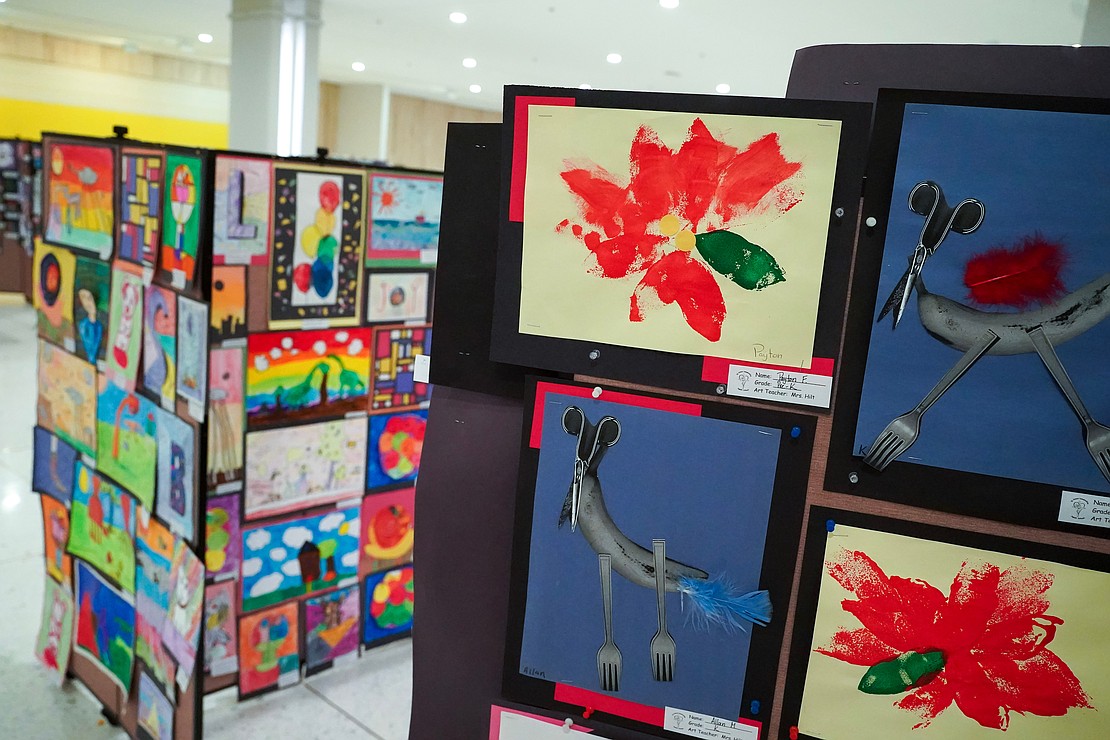 St. Kateri Tekakwitha School students’ artwork (r.), is part of the Catholic Schools Week Art Exhibit at the Empire State Plaza South Concourse in Albany. (Cindy Schultz photo for The Evangelist)