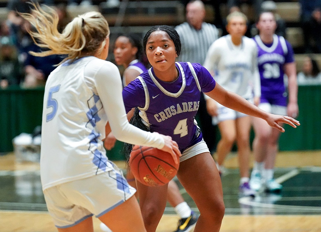 Catholic Central’s Kelise Campbell defends against Columbia’s Kendyl Ouimette during the Crusaders' Section II Class AA final basketball game on March 10 at Hudson Valley Community College in Troy. (Cindy Schultz photo for The Evangelist)