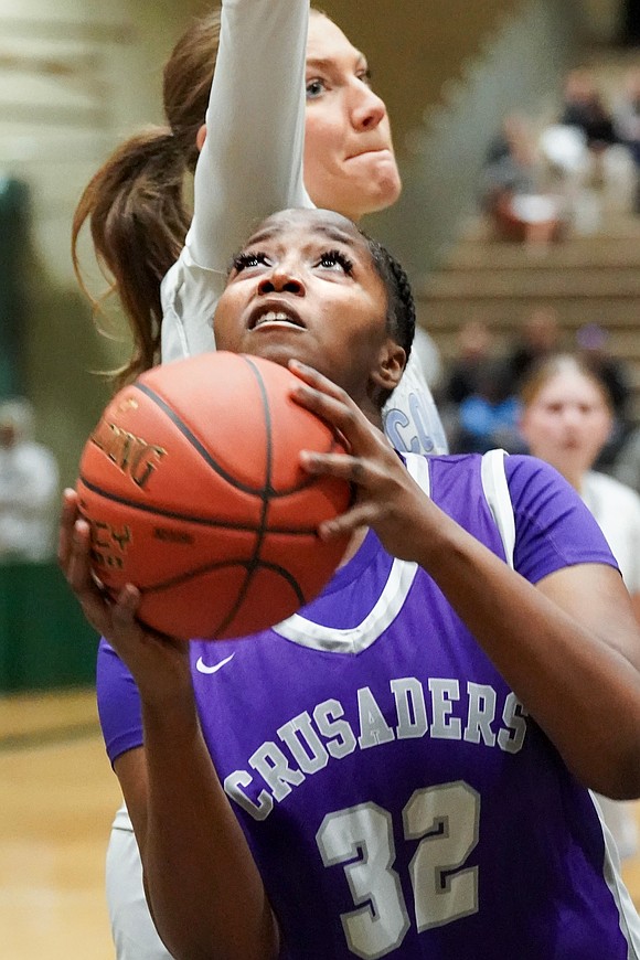 Catholic Central’s Akarri Gaddy aims for the hoop during the Crusaders' Section II Class AA final basketball game on March 10 at Hudson Valley Community College in Troy. (Cindy Schultz photo for The Evangelist)