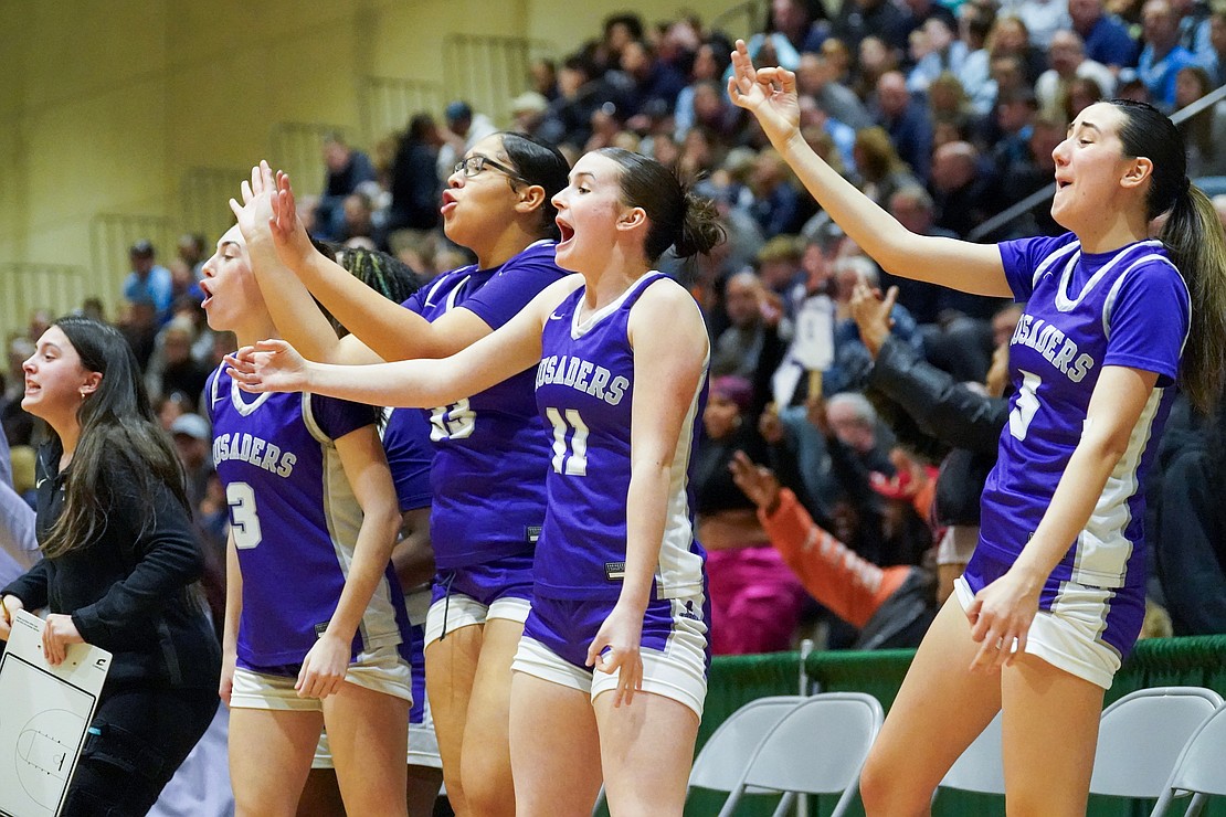 Catholic Central’s bench cheers for a three-point basket during the Crusaders' Section II Class AA final basketball game on March 10 at Hudson Valley Community College in Troy. (Cindy Schultz photo for The Evangelist)