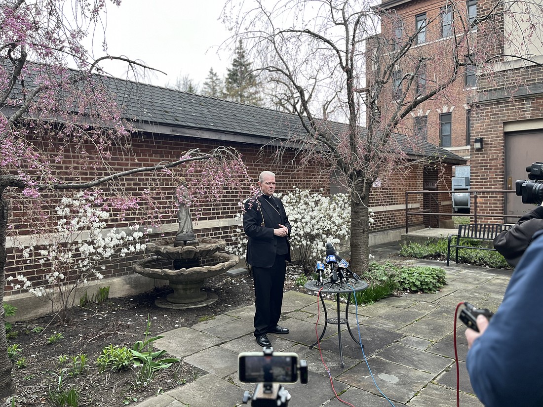 In meeting with the media at the Pastoral Center on April 21, Bishop Edward B. Scharfenberger recalled memories of Pope Francis, saying, "The energy that came from his heart and his compassion for those who were down and out seemed to radiate and even give him life as well. I think that's where his strength is from. That’s what I remember best.” (Emily Benson photo)