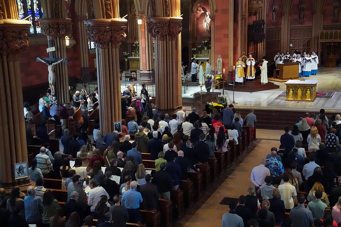 Bishop Edward B. Scharfenberger presides over Easter Mass on April 20 at the Cathedral of the Immaculate Conception in Albany. (Cindy Schultz photo for The Evangelist)