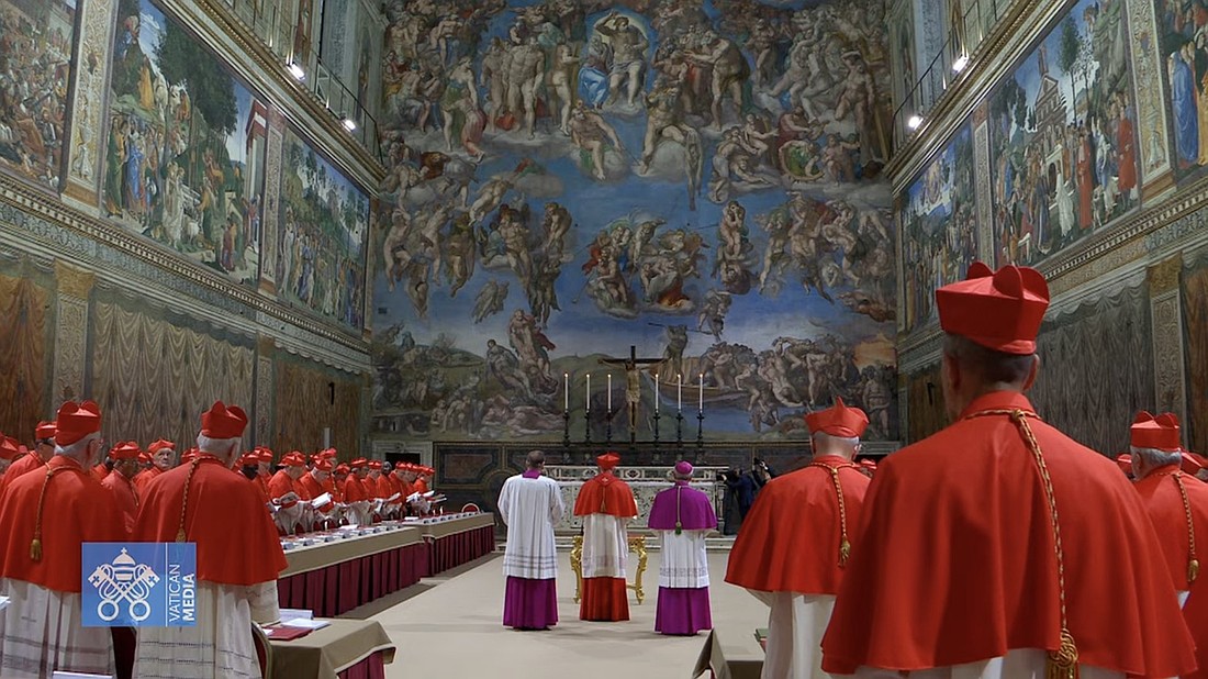 Cardinal Pietro Parolin stands before a Book of the Gospels as cardinals process into the Sistine Chapel before the conclave to elect a new pope begins at the Vatican May 7, 2025. (CNS screengrab/Vatican Media)
