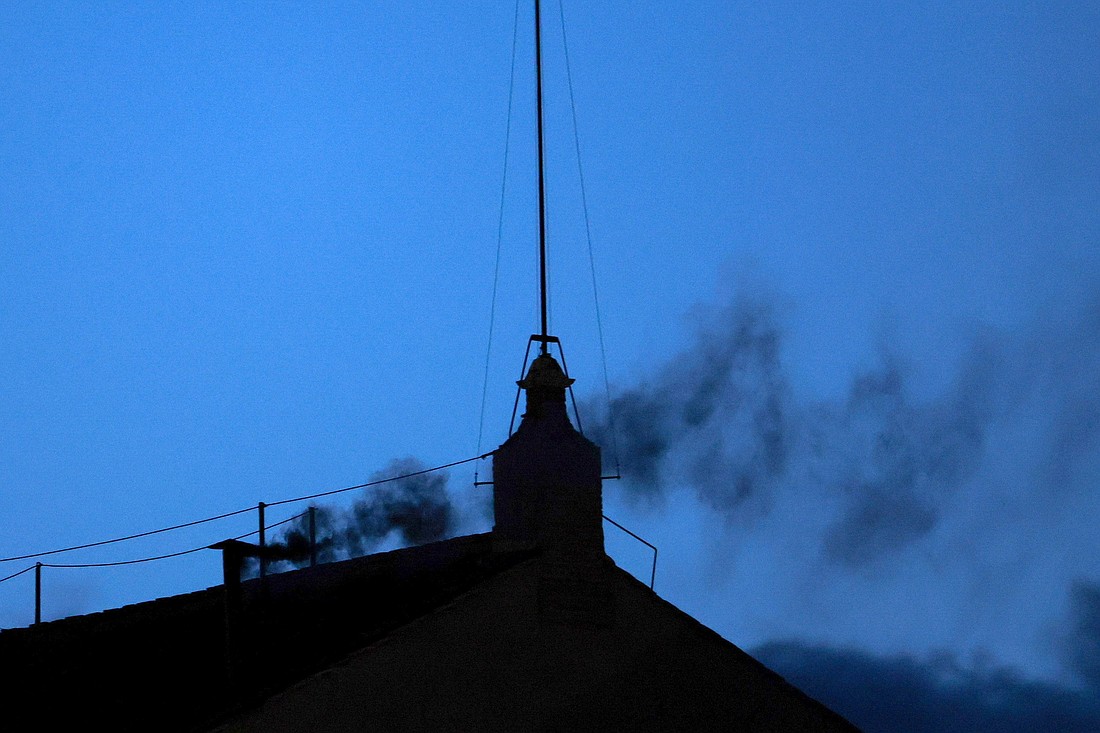 Black smoke billows from the chimney on the Sistine Chapel May 7, 2025, on the first day of the conclave. The black smoke indicated that cardinals did not elect a new pope. (OSV News photo/Murad Sezeri, Reuters)