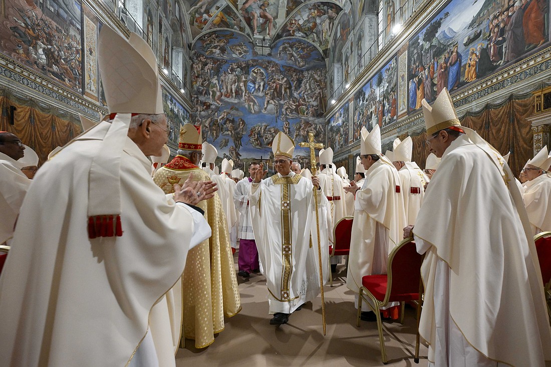 Pope Leo XIV processes out of the Sistine Chapel after celebrating his first Mass as pope with the cardinals who elected him at the Vatican May 9, 2025. (CNS photo/Vatican Media)