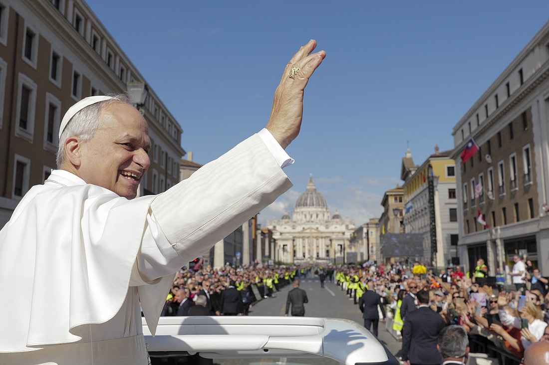 Pope Leo XIV greets the faithful as he enters St. Peter's Square on the popemobile before his inauguration Mass at the Vatican May 18, 2025. (CNS photo/Vatican Media)