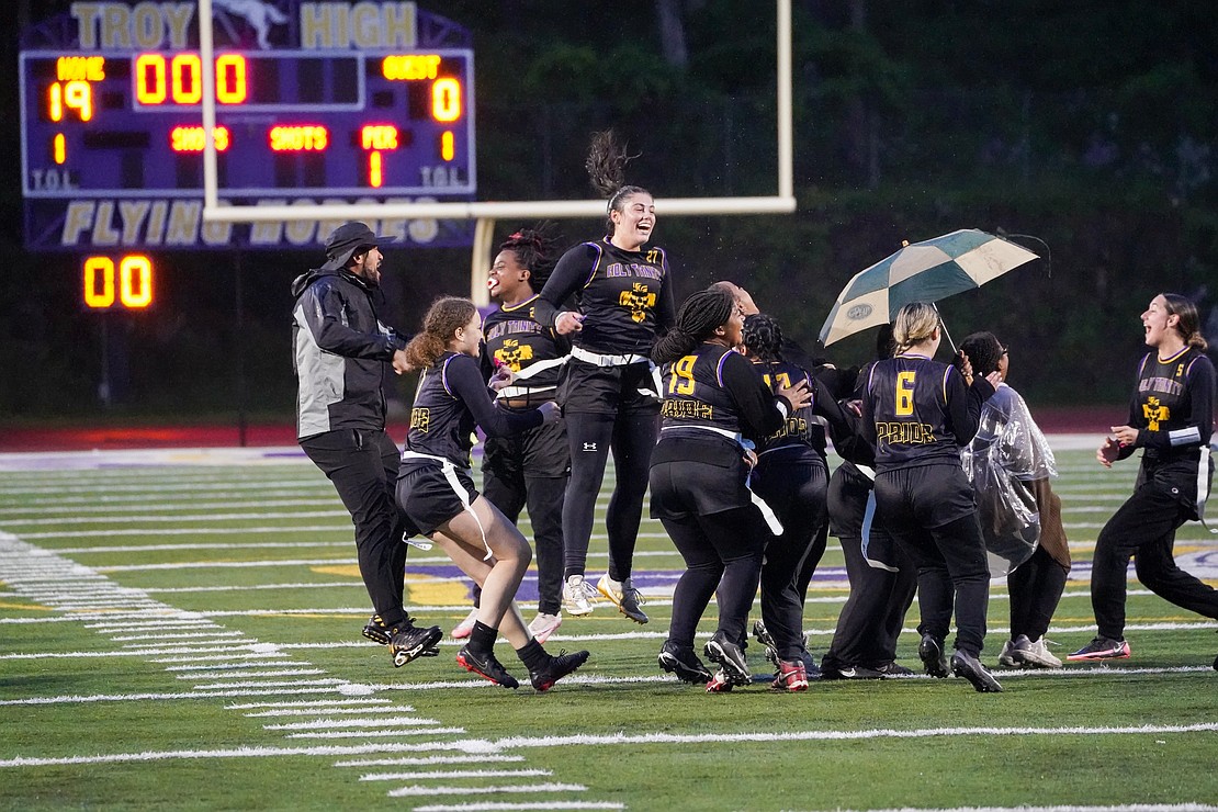 Holy Trinity celebrates their Section II Class C flag football championship on May 22 at Troy High School in Troy. The Pride beat Broadalbin-Perth, 19-0. (Cindy Schultz photo for The Evangelist)