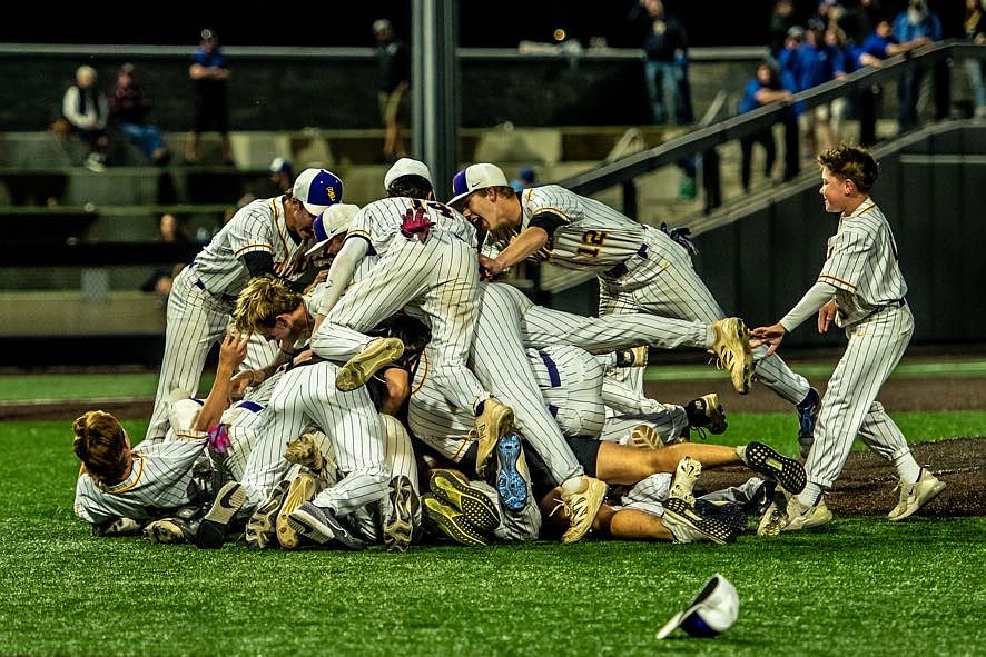 The Saratoga Central Catholic baseball team made history last weekend with a 4-0 win over top-ranked Deposit/Hancock at SUNY Binghamton Stadium on June 14. The Saints pictured celebrate after their win. (Provided photo)