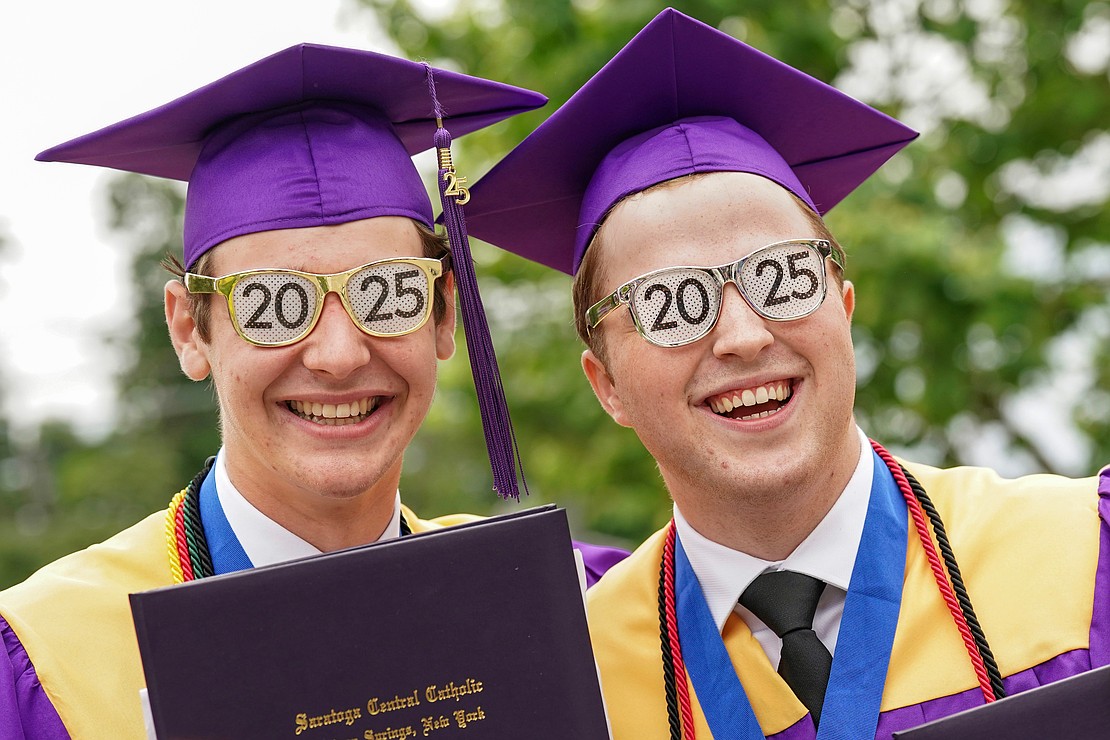 Salutatorian David Mattes, left, and fellow graduate James Comstock show off their festive eye glasses following Saratoga Catholic Central’s commencement exercises on Friday June 27, 2024, at St. Clement’s Church in Saratoga Springs, N.Y.  Cindy Schultz for The Evangelist