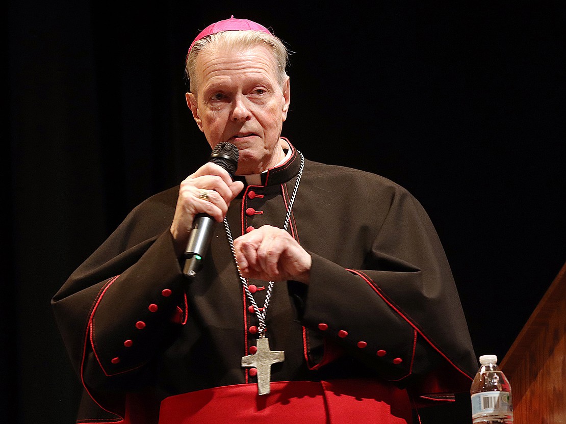 Bishop Edward B. Scharfenberger delivers the closing remarks during Catholic Central's 102nd Commencement on June 7 at Russell Sage College in Troy. (Tom Killips photo)