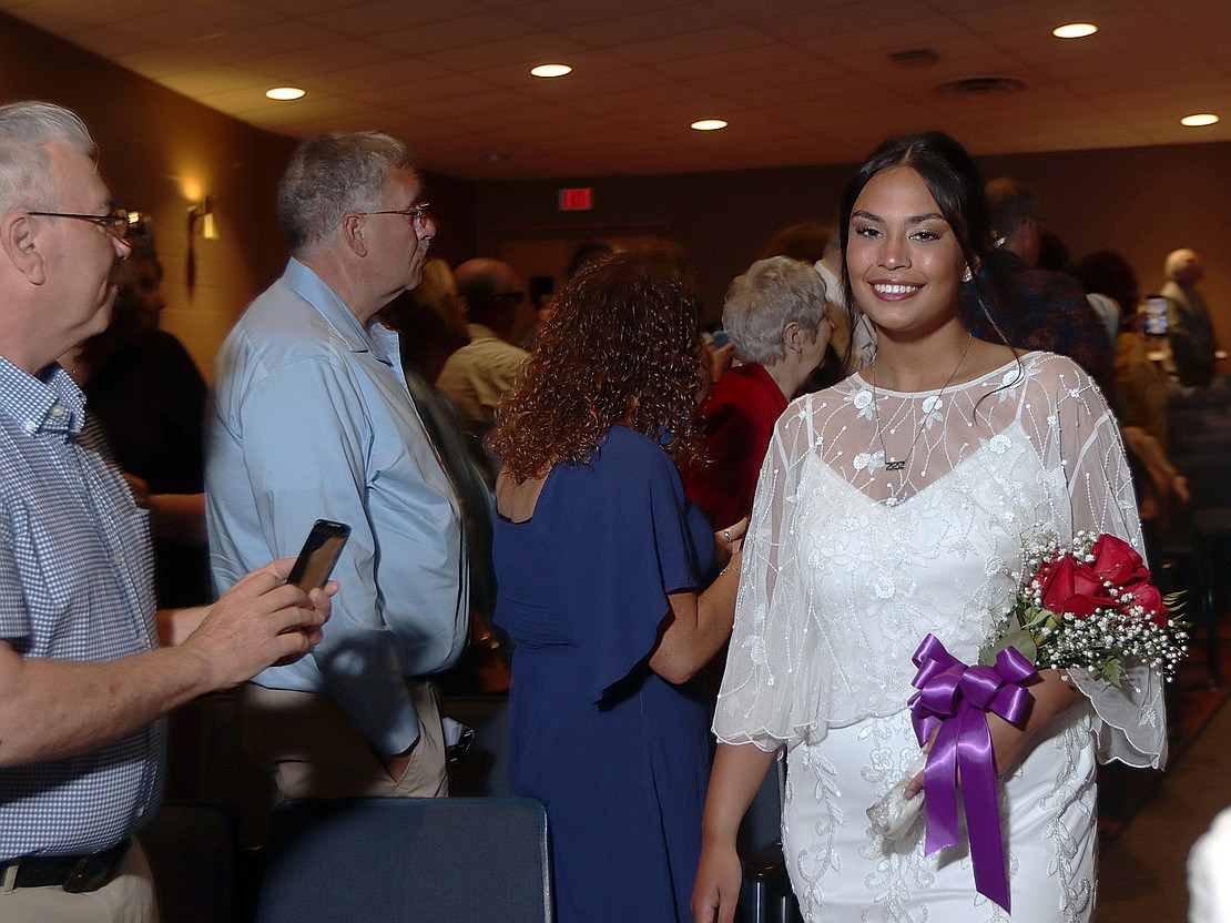 Donata Ezekiel processes to the stage for Catholic Central's 102nd commencement Saturday afternoon at Russell Sage College in Troy.