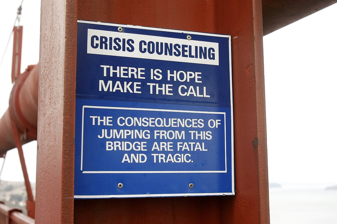 A suicide prevention sign is seen on the Golden Gate Bridge in San Francisco in 2008. National Suicide Prevention Month is observed in September. (OSV News photo/Gregory A. Shemitz)
