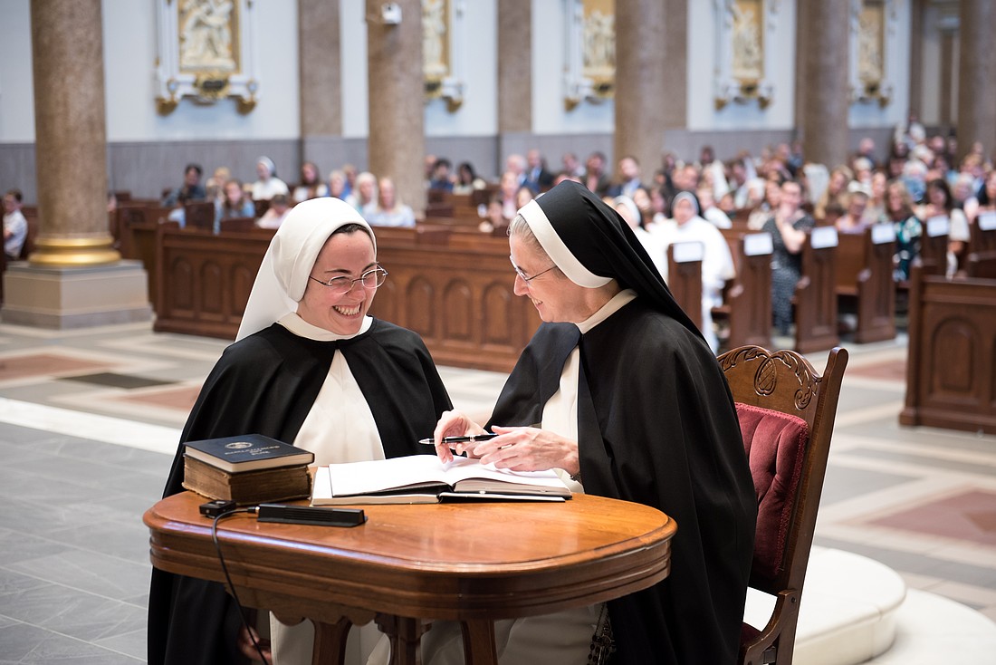 Sister Marie Elisabeth Borosky, OP, (left) a former parishioner of St. Pius X in Loudonville, made her First Procession with the Dominican Sisters of Saint Cecilia Congregation on Aug. 11. (Photos provided)