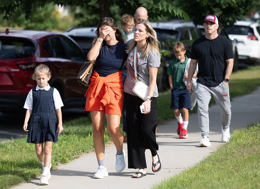 Families and loved reunite following a shooting at Annunciation Catholic School in Minneapolis Aug. 27, 2025. A shooter opened fire with a rifle through the windows of a the school church and struck children celebrating Mass during the first week of school, killing two and wounding 17 people in an act of violence the police chief called “absolutely incomprehensible.” (OSV News photo/Dave Hrbacek, The Catholic Spirit)