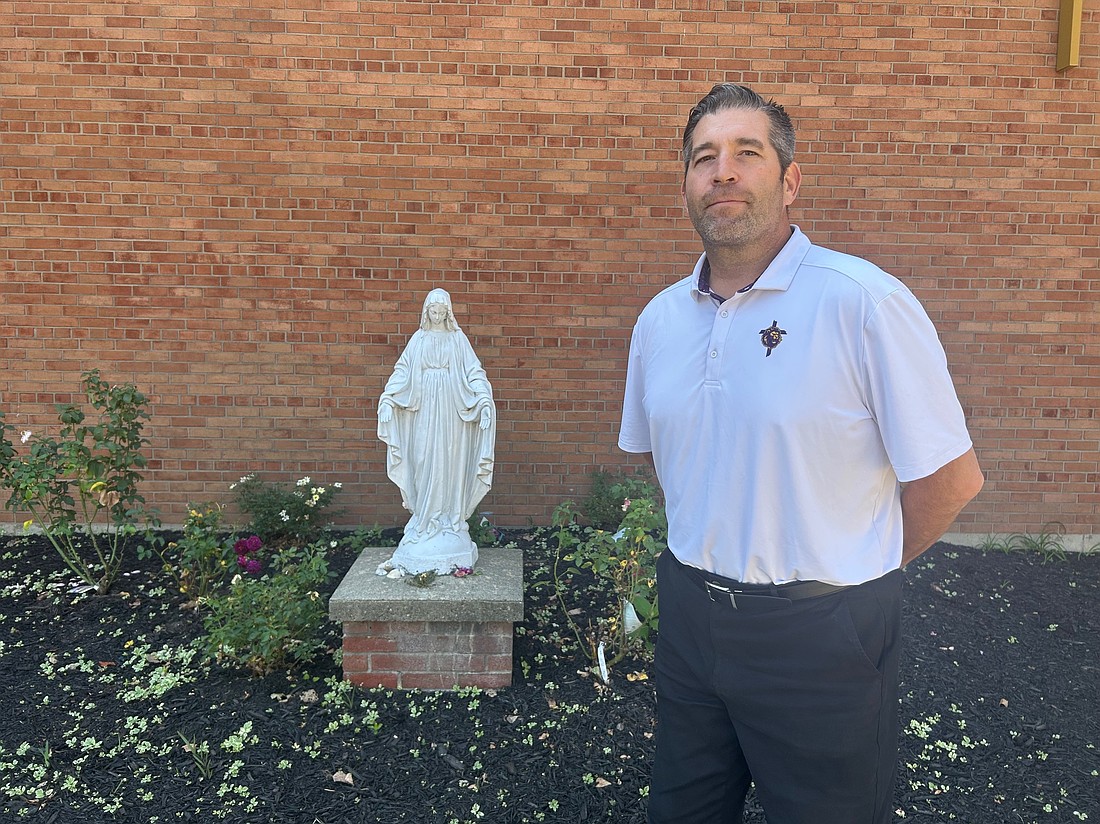 Jay Mahoney, who has been at Notre Dame-Bishop Gibbons School for 18 years, said of his appointment as interim principal: “What I said to the families, to the kids and to the teachers is I am a coach at heart and this isn’t my building, this is our building and we have to work together to make it a successful school year.” (Mike Matvey photo)