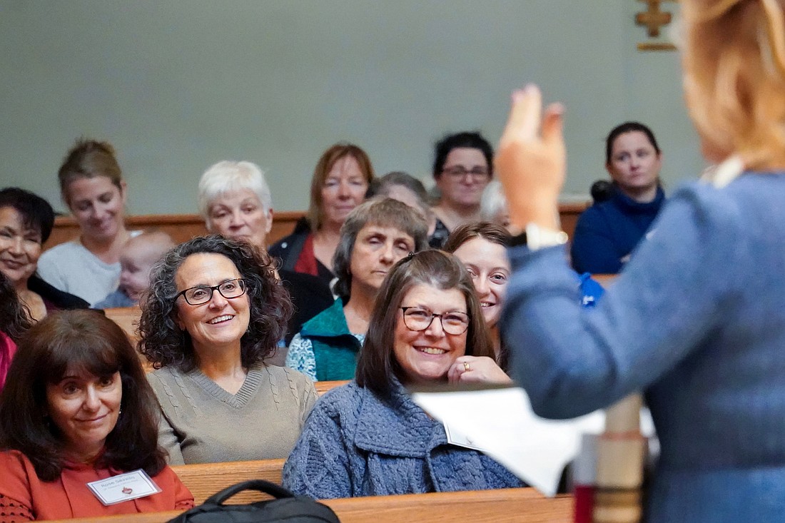 The congregation responds to speaker Danielle Bean on the topic of “Renewed in Hope: Finding God in the Struggles and Joys of Daily Life” during the Unleashing Love Women’s Retreat on Saturday, Oct. 18, 2025, at St. Edward the Confessor in Clifton Park, N.Y.  Cindy Schultz for The Evangelist