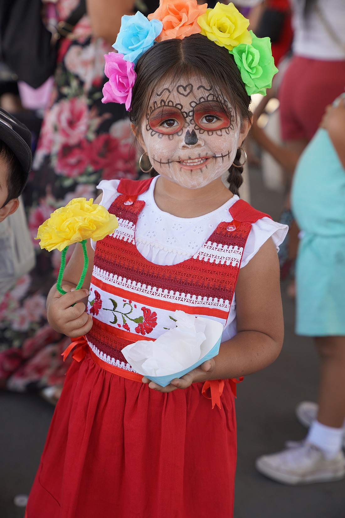 A girl poses during the Dia de los Muertos (Day of the Dead) celebration at Santa Clara Cemetery in Oxnard, Calif., in this file photo. Day of the Dead is a Mexican custom traditionally observed Nov. 1 and 2 to remember family and friends who have died. (CNS photo/Sarah Yaklic, courtesy Archdiocese Los Angeles)