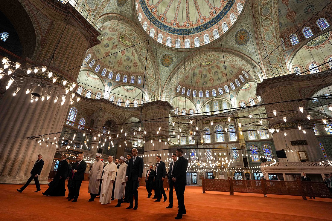 Pope Leo XIV walks with Turkish Muslim leaders and aides as they exit the Sultan Ahmed Mosque, also known as the Blue Mosque, after a private visit in Istanbul, Turkey, Nov. 29, 2025. The pope had toured the historic site and met with Kurra Hafiz Fatih Kaya, the mosque’s imam; Emrullah Tuncel, the mufti of Istanbul; and Askin Musa Tunca, the mosque’s muezzin. (CNS photo/Lola Gomez)