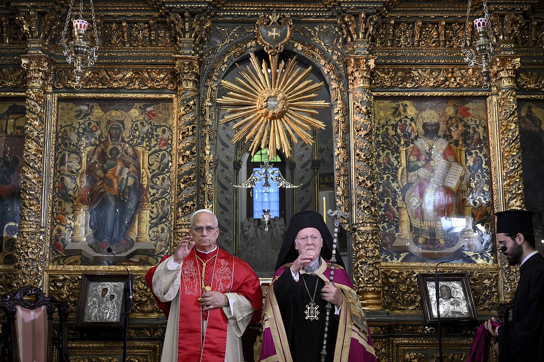Pope Leo XIV and Orthodox Ecumenical Patriarch Bartholomew of Constantinople give the final blessing together at the end of a prayer service Nov. 29, 2025, in the Patriarchal Cathedral of St. George in Istanbul. (CNS photo/Vatican Media)