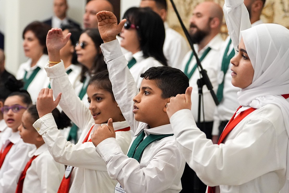 Children perform a musical number for Pope Leo XIV during a welcome ceremony with Lebanese President Joseph Aoun at the presidential palace in Beirut Nov. 30, 2025. (CNS photo/Lola Gomez)