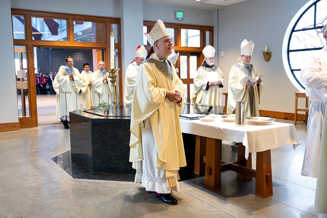 Bishop Mark W. O'Connell processes into St. Edward the Confessor in Clifton Park on Friday, December 5, 2025, before his Installation Mass. (Patrick Dodson photo)