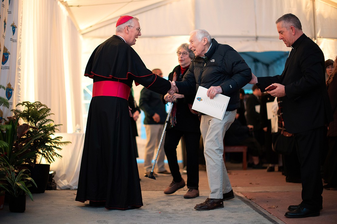 Bishop Mark O'Connell greets the faithful after his Installation Mass at St. Edward the Confessor in Clifton Park on Friday, December 5, 2025. (Patrick Dodson photo)