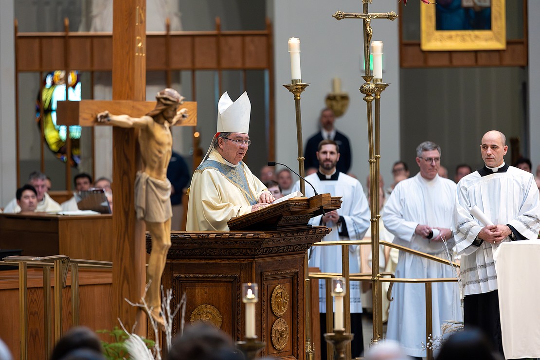 Cardinal Christophe Pierre, the Apostolic Nuncio to the United States, reads the Apostolic Mandate from Pope Leo XIV, naming Bishop Mark W. O'Connell as the 11th Bishop of Albany. (Patrick Dodson photo)
