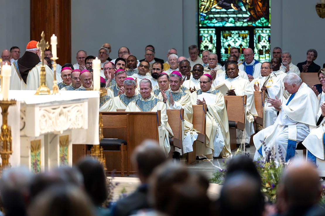 Bishop Edward B. Scharfenberger, the 10th Bishop of Albany, is recognized during the Installation Mass of Bishop Mark W. O'Connell. (Patrick Dodson photo)