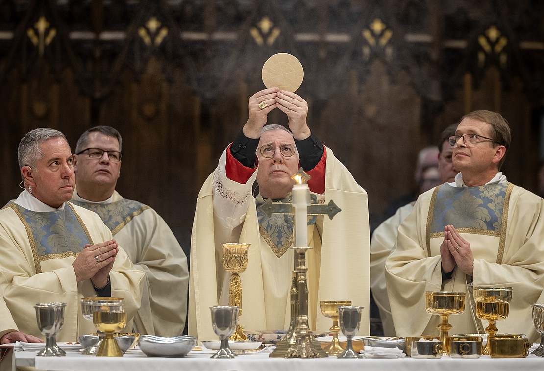 Bishop Mark O'Connell is shown during the Consecration of the Eucharist during his Installation Mass on Dec. 5. (Dino Petrocelli photo for The Evangelist)