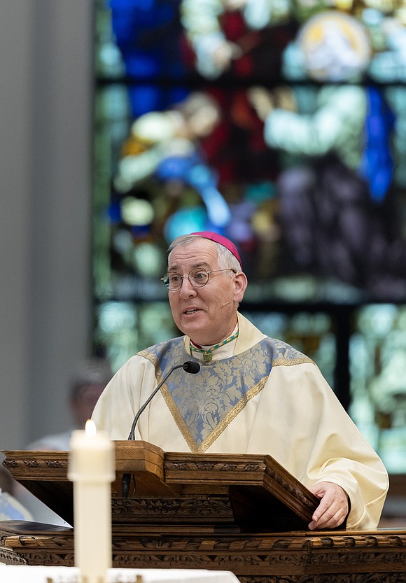 Bishop Mark O'Connell is shown during his homily at St. Edward the Confessor Church during his Installation Mass. (Dino Petrocelli photos for The Evangelist)