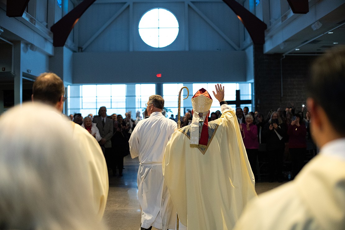 Bishop Mark O'Connell leaves the worship space at St. Edward the Confessor Church after his Installation Mass on Dec. 5. (Patrick Dodson photo for The Evangelist)