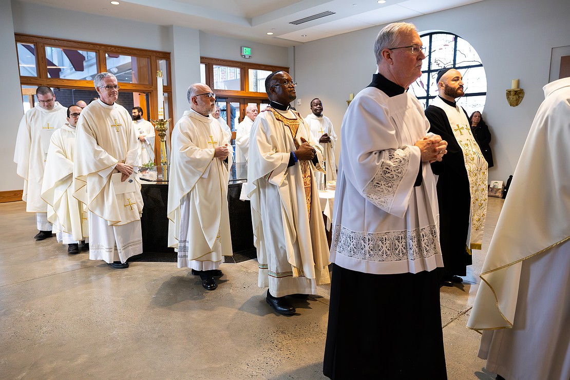 Civic leaders, honored guests, ecumenical leaders, deacons, priests, bishops and cardinals process into St. Edward the Confessor Church during Bishop Mark O'Connell's Installation Mass on Dec. 5. (Patrick Dodson photo for The Evangelist)