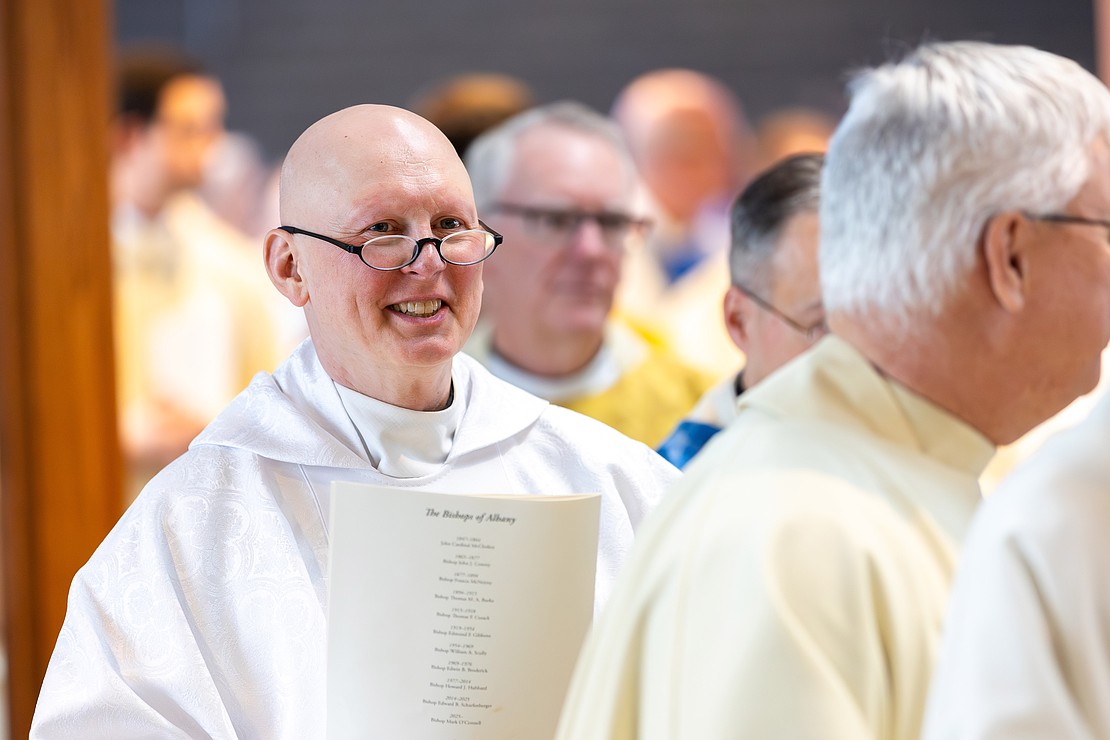 Civic leaders, honored guests, ecumenical leaders, deacons, priests, bishops and cardinals process into St. Edward the Confessor Church during Bishop Mark O'Connell's Installation Mass on Dec. 5. (Patrick Dodson photo for The Evangelist)