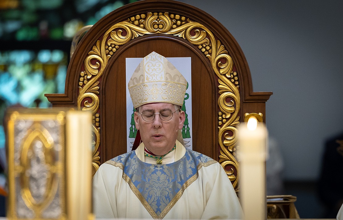 Bishop Mark O'Connell closes his eyes in a prayerful moment of reflection during the Installation Mass. (Dino Petrocelli photo for The Evangelist)