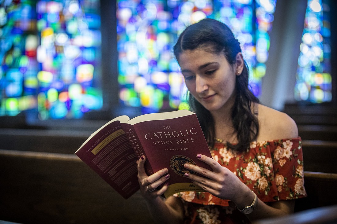 A woman is pictured in a file photo reading the Bible. (OSV News photo/Chaz Muth)