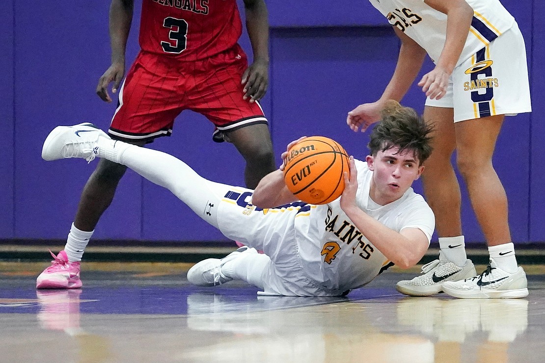 Spa Catholic’s Thomas Zayac recovers a loose ball and looks to pass during their basketball game against Tamarac on Friday, Jan. 9, 2026, at Saratoga Catholic Central School in Saratoga Springs, N.Y. Spa Catholic wins 63-58.  Cindy Schultz for The Evangelist