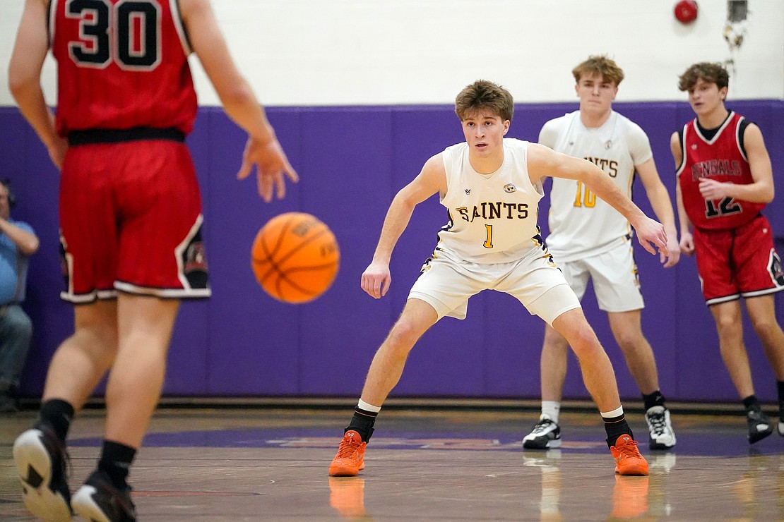 Spa Catholic’s Jasyn Thompson, center, defends during their basketball game against Tamarac on Friday, Jan. 9, 2026, at Saratoga Catholic Central School in Saratoga Springs, N.Y. Spa Catholic wins 63-58.  Cindy Schultz for The Evangelist