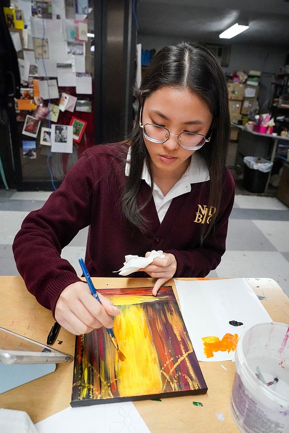 Scarlette Tou paints during 11th-grade art class on Thursday, Jan. 14, 2026, at Notre Dame-Bishop Gibbons School in Schenectady, N.Y.  Cindy Schultz for The Evangelist