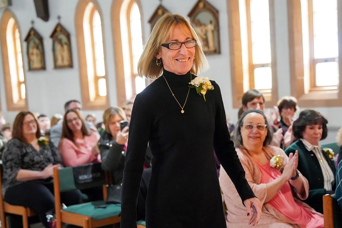 Mary Kate Green, who works at St. Mary’s School in Waterford, is recognized for her 40 years of service during the Catholic Schools mass on Friday, Jan. 23, 2026, at St. Jude the Apostle Church in Wynantskill, N.Y.  Cindy Schultz for The Evangelist