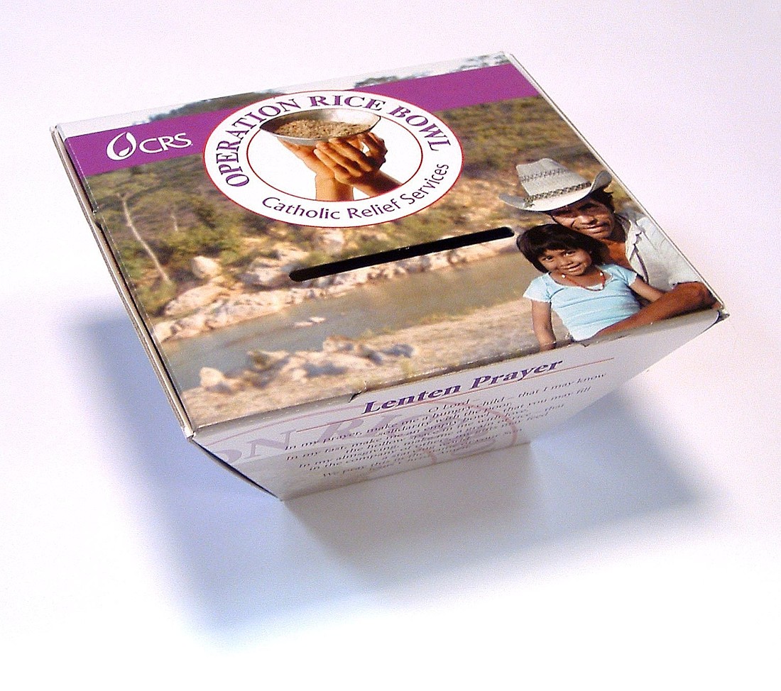 Catholic Relief Services provides cardboard collection boxes to facilitate donations to Operation Rice Bowl during the Lenten season. With funds raised through the program, CRS responds to the needs of the poor in the United States and overseas. (OSV News photo/CRS)
