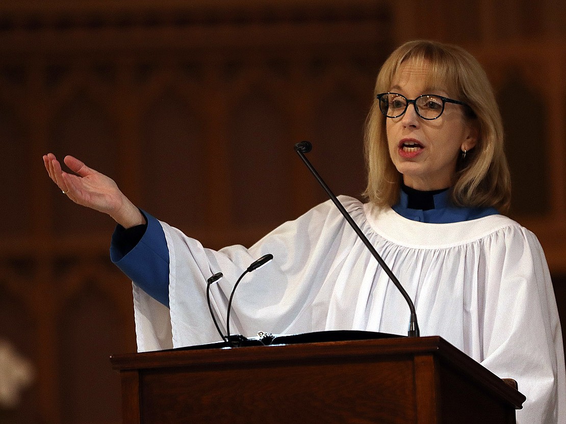 Cantor Ann Marie Adamick sings during the Ash Wednesday service at the Cathedral of the Immaculate Conception on Feb. 18 (Thomas Killips photo)