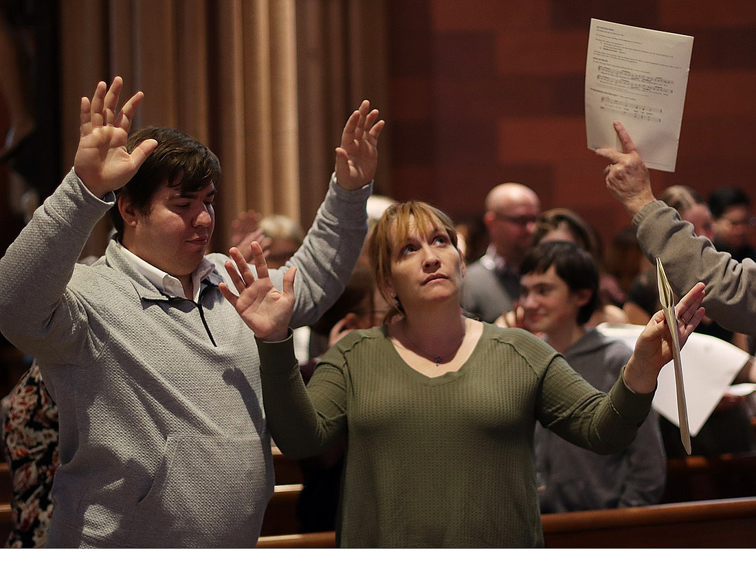 Ethan Noonan is show with his fiancée, Hope Secore, a catechumen, during the Rite Of Election Service at the Cathedral of the Immaculate Conception on Feb. 22 (Thomas Killips photo).