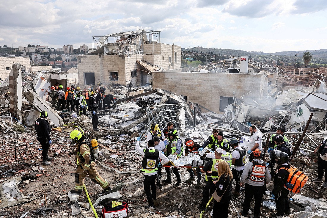 Emergency response teams attend the scene of a fatal Iranian strike in Beit Shemesh, Israel, March 1, 2026, after Iran launched missile barrages following attacks by the U.S. and Israel. (OSV News photo/Itay Cohen, Reuters) Editors: NO USE IN ISRAEL. NO COMMERCIAL OR EDITORIAL SALES IN ISRAEL