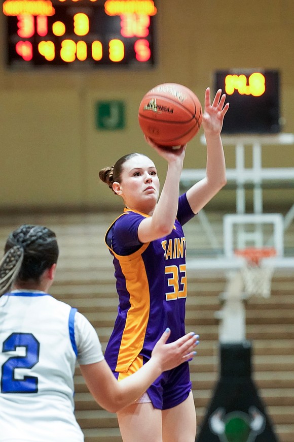 Saratoga Catholic’s Sophia Ryan, center, shoots and hits a three-point shot during their Section II Class D final basketball game against Northville on Saturday, March 7, 2026, at Hudson Valley Community College in Troy, N.Y. Saratoga Catholic wins 43-41.  Cindy Schultz for The Evangelist