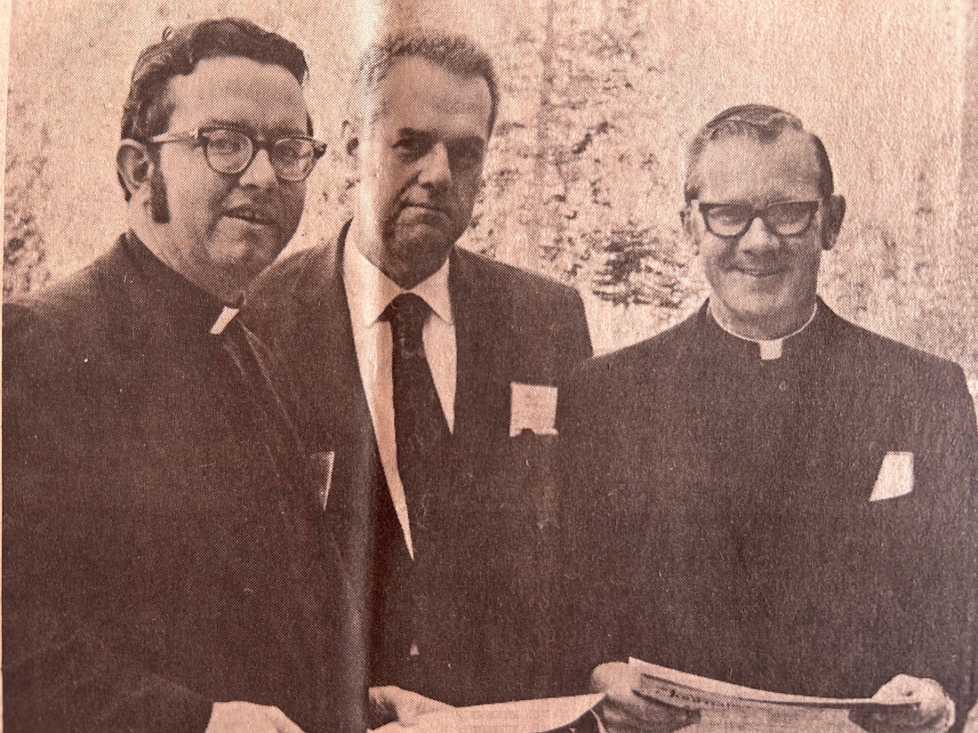 Father Kenneth J. Doyle, assistant editor (l.), and Father William F. Jillisky, editor (r.), stand with James A. Doyle, Catholic Press Association executive secretary, after The Evangelist took home four CPA awards during the 1972 awards presentation in Banff, Canada. (Evangelist file photo)