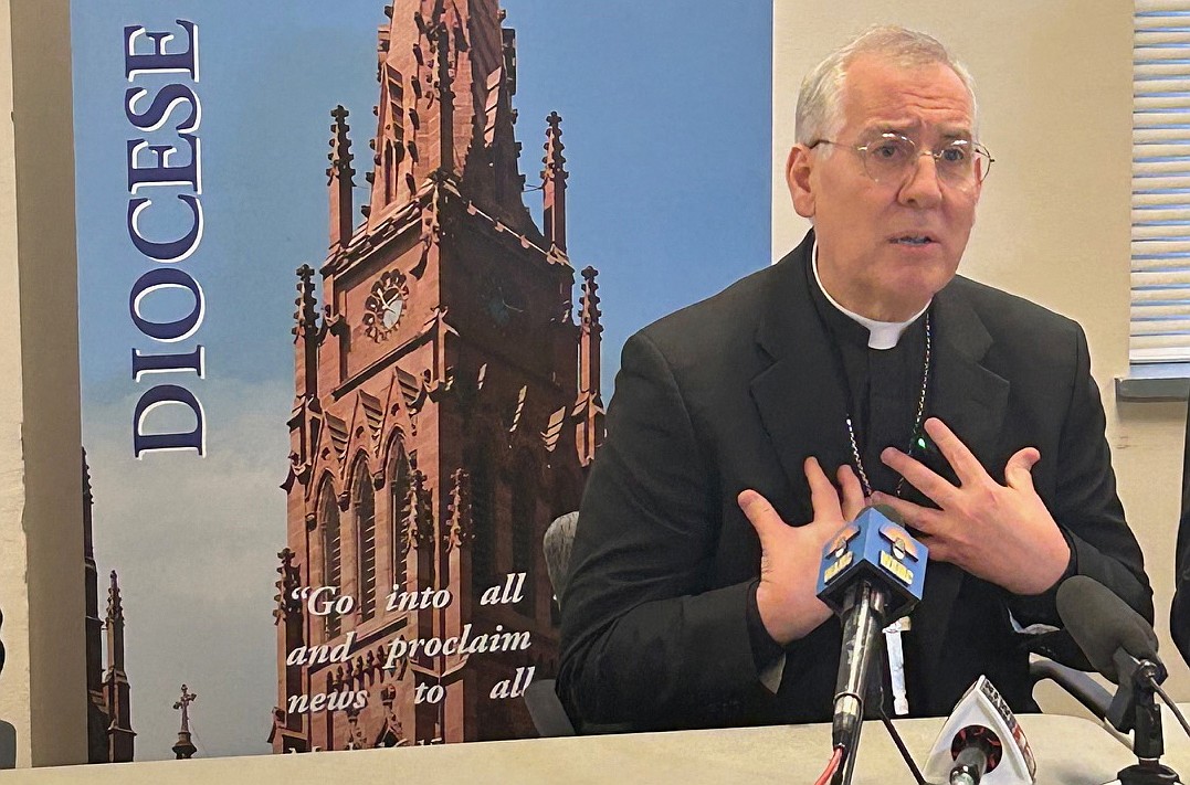 Bishop Mark O’Connell, shown talking to the media after the Diocese agreed on March 27 to pay $148 million to survivors of sexual abuse, said: “We paid from our hurt, from our sacrifice, but there’s no way that this is enough where everyone is happy. I have no regrets in leading the Diocese of Albany to reach this number.” (Mike Matvey photo)