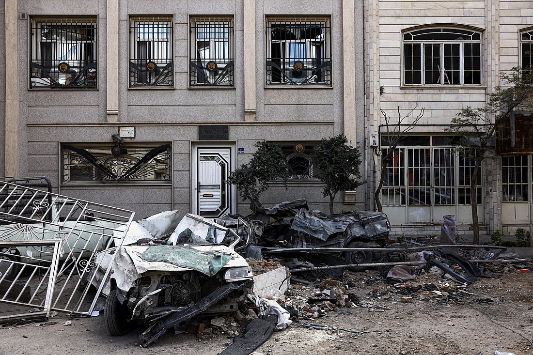 A car and residential building damaged by a strike amid the U.S.-Israeli conflict with Iran are pictured in Tehran, Iran, March 30, 2026. (OSV News photo/Majid Asgaripour, West Asia News Agency via Reuters) EDITORS - THIS PICTURE WAS PROVIDED BY A THIRD PARTY