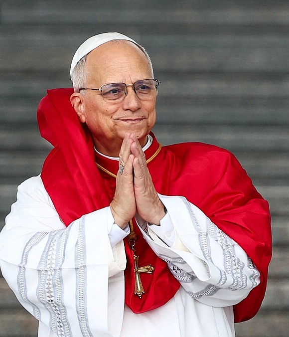 Pope Leo XIV gestures during a visit to Maqam Echahid (Martyr's Memorial) in El Madania municipality in Algiers, Algeria, April 13, 2026. (OSV News photo/Guglielmo Mangiapane pool via Reuters)