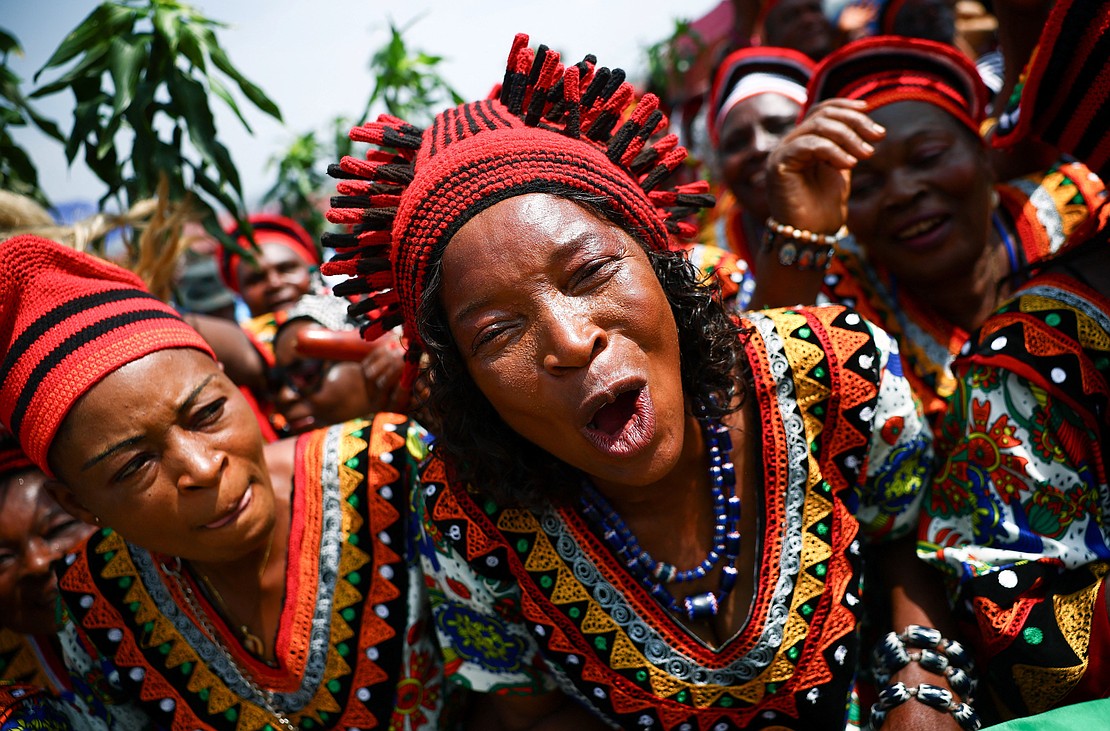 Women react as people gather outside St. Joseph's Cathedral in Bamenda, Cameroon, April 16, 2026, as they wait for the arrival of Pope Leo XIV for a Meeting for Peace. (OSV News photo/Guglielmo Mangiapane, Reuters)