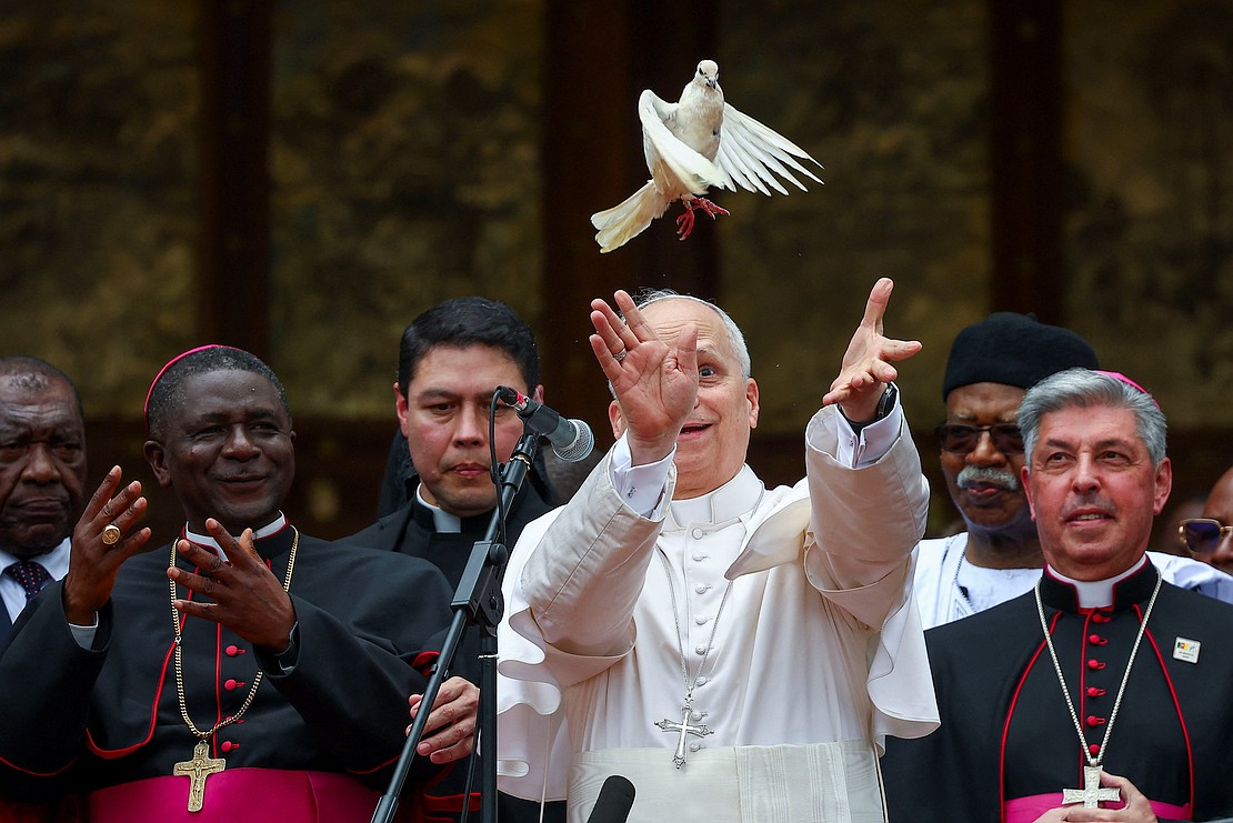 Pope Leo XIV releases a dove after he attended a Meeting for Peace at St. Joseph's Cathedral in Bamenda, Cameroon, April 16, 2026. (OSV News photo/Guglielmo Mangiapane, Reuters)